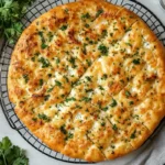 Freshly baked cottage cheese flatbread stored in a sealed container and wrapped in parchment paper for maximum freshness and shelf life.